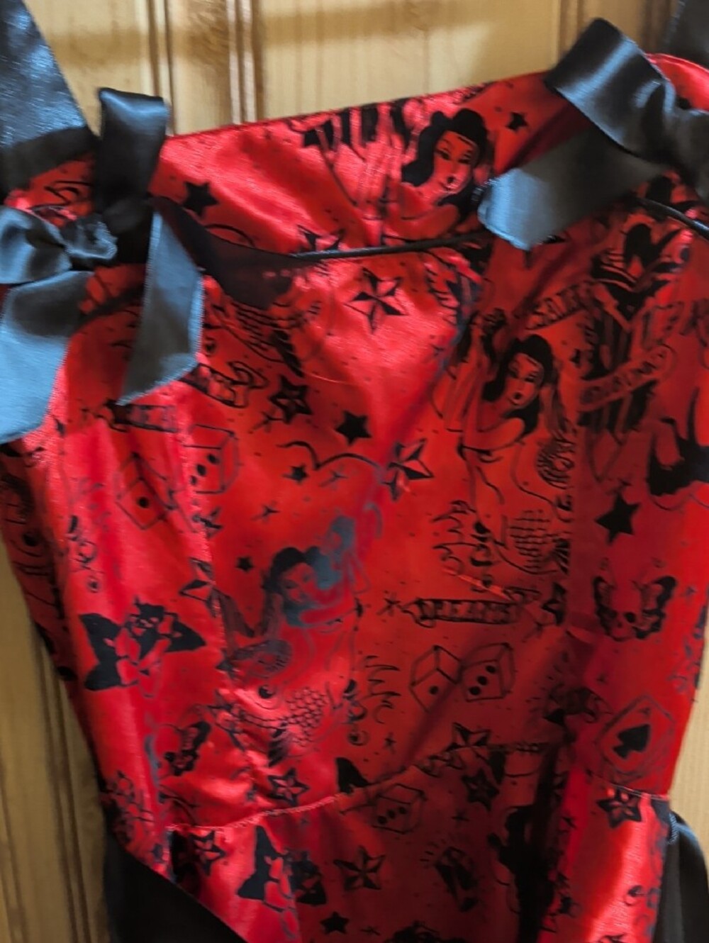Hell Bunny Red Satin High-Low Dress with Black Trim and Bow Accents - Picture 2 of 9